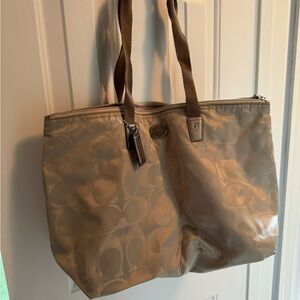 Coach tan over night tote bag